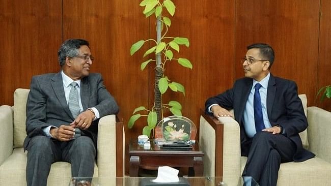 Indian High Commissioner to Bangladesh Pranay Kumar Verma calls in agricultural minister Mohammad Abdur Razzaque at the latter’s Secretariat office, Dhaka on 5 January 2023