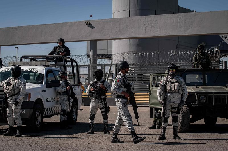 Members of the National Guard and Mexican Army secure the main entrance to the maximum security prison of "El Altiplano" in Almoloya de Juarez, Mexico, on 6 January, 2023