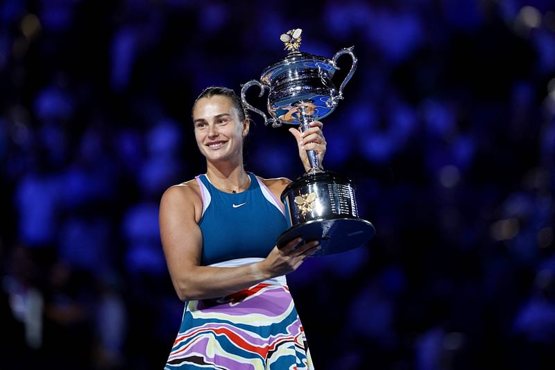 Belarus' Aryna Sabalenka poses with the trophy after winning against Kazakhstan's Elena Rybakina during the women's singles final on day thirteen of the Australian Open in Melbourne on 28 January, 2023