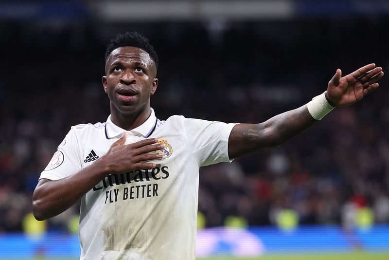 Real Madrid's Brazilian forward Vinicius Junior celebrates after scoring his team's third goal during the Copa del Rey quarter final between Real Madrid CF and Club Atletico de Madrid at the Santiago Bernabeu stadium in Madrid on 26 January, 2023