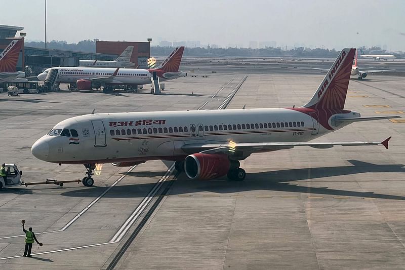 An Air India aircraft is pictured on the tarmac at the Indira Gandhi International airport in New Delhi on 20 January 2023.