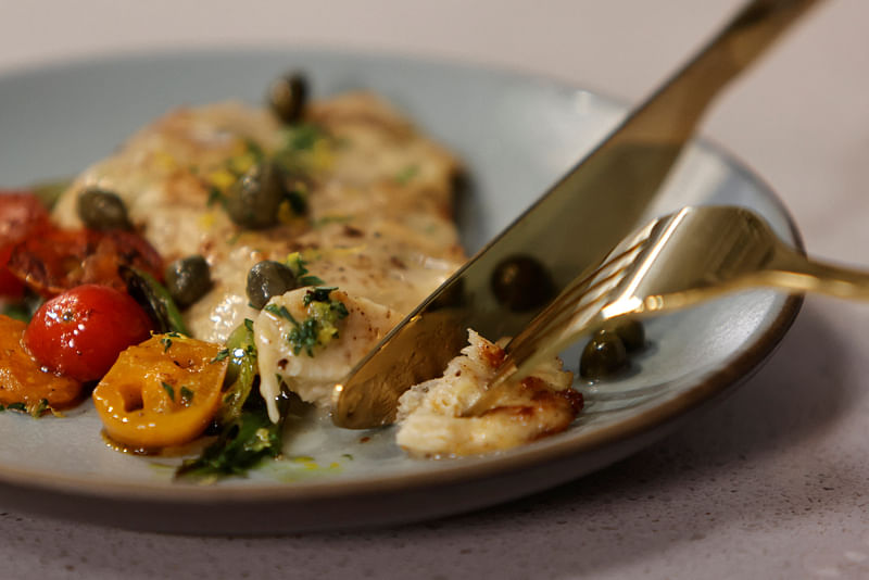 A view shows a cooked piece of cultivated chicken breast created at the UPSIDE Foods plant, where lab-grown meat is cultivated, in Emeryville, California, US 11 January, 2023.