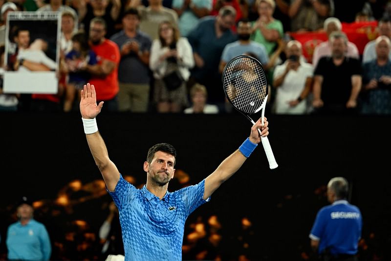 Serbia's Novak Djokovic celebrates victory against Australia's Alex De Minaur after their men's singles match on day eight of the Australian Open in Melbourne on 23 January, 2023