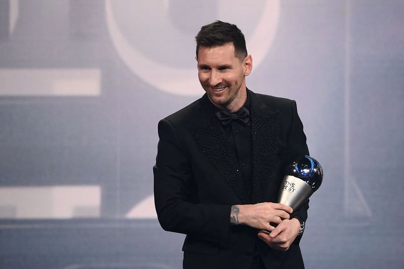 Argentina and Paris Saint-Germain forward Lionel Messi poses on stage after receiving the Best FIFA Men’s Player award during the Best FIFA Football Awards 2022 ceremony in Paris on 27 February, 2023