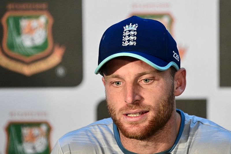 England’s captain Jos Buttler speaks during a press conference at the Sher-e-Bangla National Cricket Stadium in Dhaka on 26 February, 2023, ahead of their first one day international (ODI) cricket match against Bangladesh