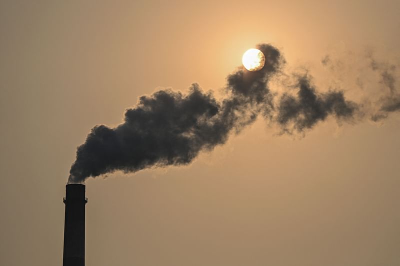 In this file photo taken on 28 September, 2021 a smokestack of the Wujing Coal-Electricity Power Station spots smoke in Shanghai. Long-term exposure to air pollution raises the risk of depression, according to a pair of new studies published in the JAMA network of scientific journals. A study published on 10 February, 2023 in JAMA Network Open found that long-term exposure to elevated levels of air pollution increases the risk of late-onset depression among the elderly.