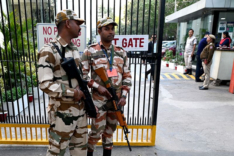 Indo-Tibetan Border Police stand guard outside the office building where Indian tax authorities raided BBC's office in New Delhi on 15 February 2023, following a protest against the BBC by Hindu Sena activists, an Indian right-wing organization.