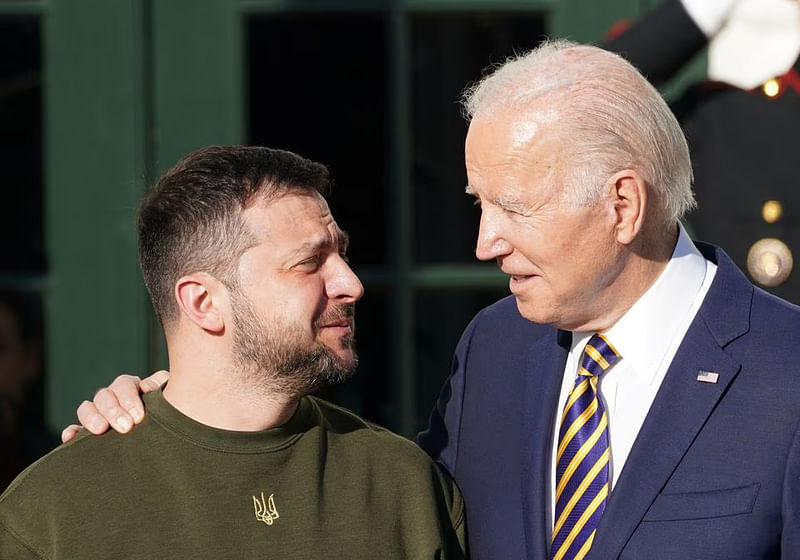 Former US President Joe Biden welcomes Ukraine's President Volodymyr Zelenskiy on the South Lawn at the White House in Washington, US,  on 21 December, 2022.