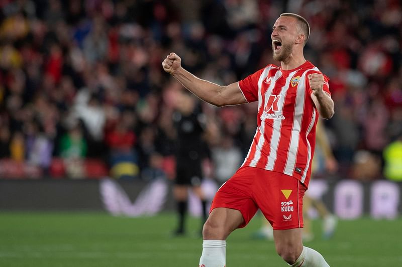 Almeria's Brazilian defender Rodrigo Ely celebrates at the end of the Spanish League football match between UD Almeria and FC Barcelona at the Municipal Stadium of the Mediterranean Games in Almeria, on 26 February, 2023