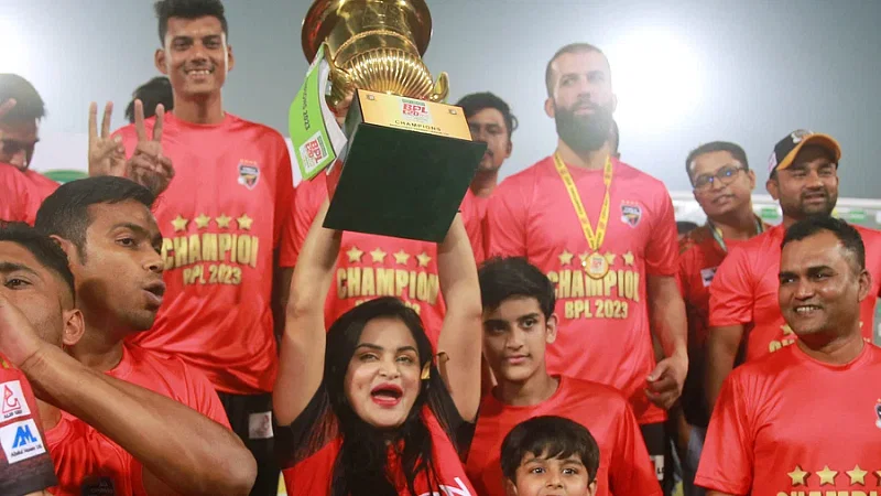 Comilla VIctorians chairperson Nafisa Kamal celebrates with the BPL trophy