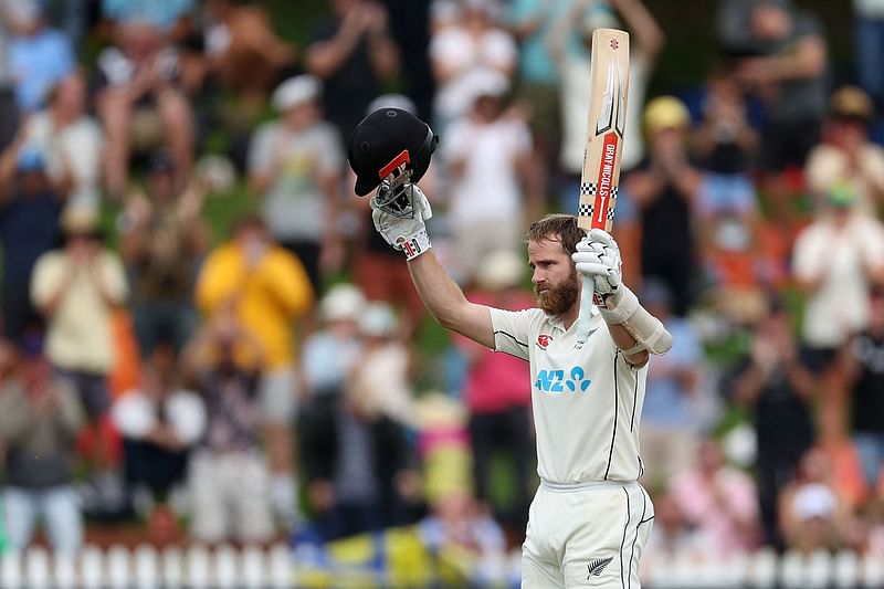 New Zealand's Kane Williamson celebrates 100 runs during day four of the second cricket Test match between New Zealand and England at the Basin Reserve in Wellington on 27 February, 2023