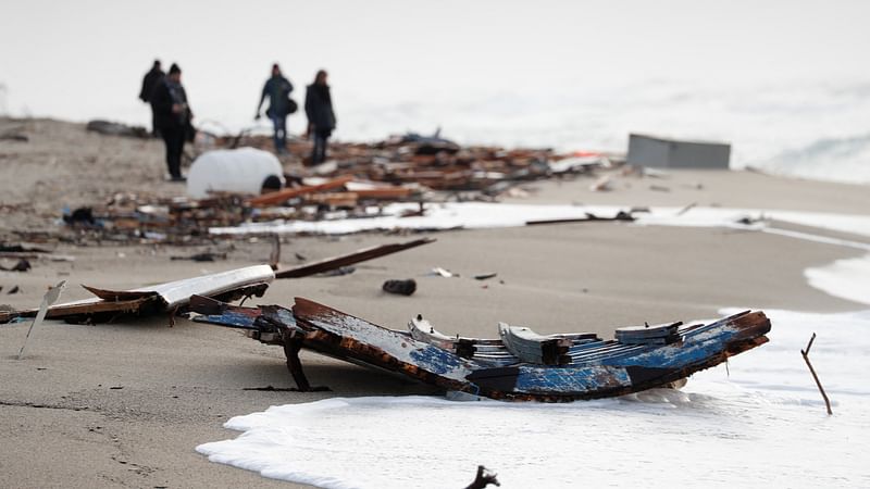 A view of the wreckage of a shipwreck in southern Italy which has left dozens of migrants dead after the boat in which they were travelling smashed onto the rocks, in Cutro, Italy, on 27 February, 2023