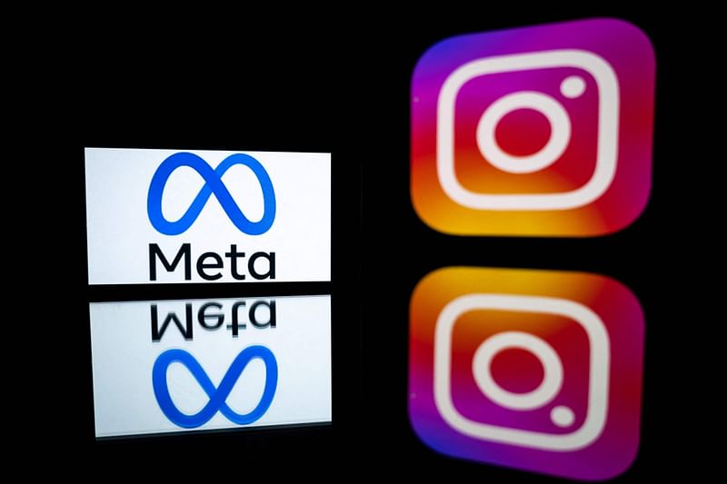 This file illustration photo taken on 12 January, 2023 in Toulouse, southwestern France, shows a smartphone and a computer screen displaying the logos of Instagram app and its parent company Meta. Facebook and Instagram owner Meta will launch a paid subscription service allowing users to verify their accounts, among other features, CEO Mark Zuckerberg said on 19 February, 2023.