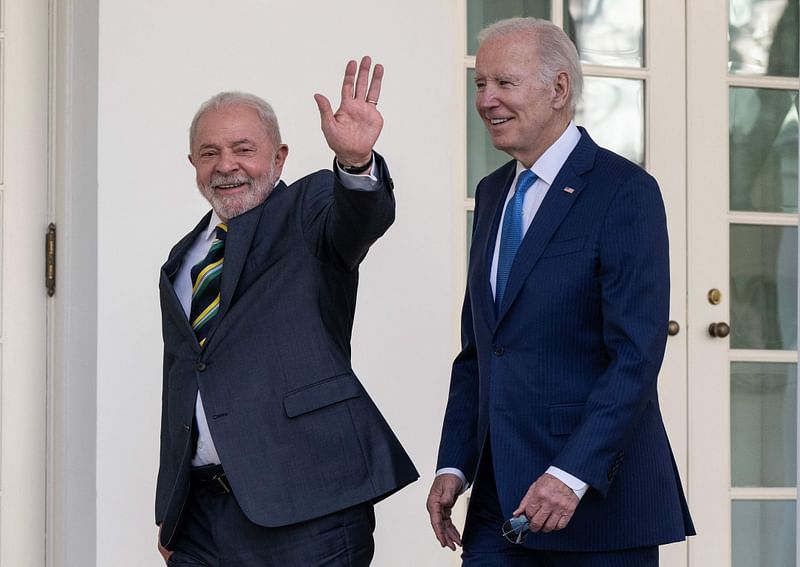 US President Joe Biden and Brazilian President Luiz Inacio Lula da Silva walk together along the Rose Garden colonnade at the White House in Washington, DC, 10 February, 2023