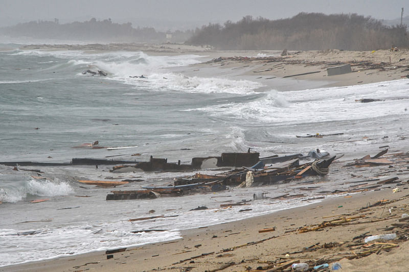 A view shows remains of a ship along the beach where bodies believed to be of refugees were found after a shipwreck, in Cutro, the eastern coast of Italy's Calabria region, Italy, 26 February 2023.