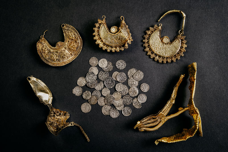 1000-year-old medieval treasure discovered in Hoogwoud, Netherlands, consisting of jewellery and silver coins, is shown in this undated handout picture obtained by Reuters.