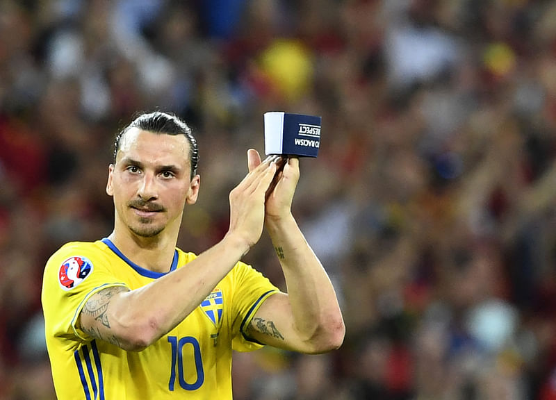 In this file photo taken on 23 June, 2016 Sweden's forward Zlatan Ibrahimovic applauds to acknowledge the spectators at the end of the Euro 2016 group E football match between Sweden and Belgium