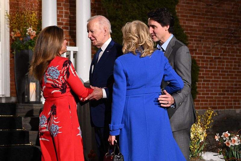 Canadian Prime Minister Justin Trudeau and his wife Sophie Grégoire Trudeau greet US President Joe Biden and First Lady Jill Biden as they arrive at Rideau Cottage, the Prime Minister’s Residence, on 23 March, 2023, in Ottawa, Canada