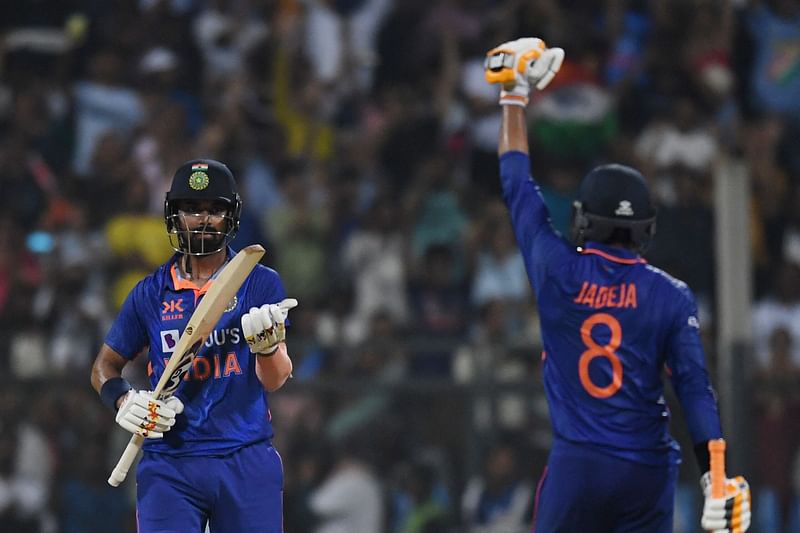 India's KL Rahul (L) and Ravindra Jadeja celebrate after winning the first one-day international (ODI) cricket match between India and Australia at the Wankhede Stadium in Mumbai on 17 March 2023.