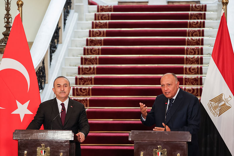 Turkish Foreign Minister Mevlut Cavusoglu and Egyptian Foreign Minister Sameh Shoukry attend a news conference in Cairo, Egypt 18 March, 2023