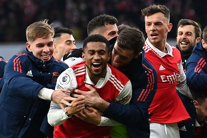 Arsenal's English midfielder Reiss Nelson celebrates after scoring his team's third goal during the English Premier League match between Arsenal and Bournemouth at the Emirates Stadium in London on 4 March 2023