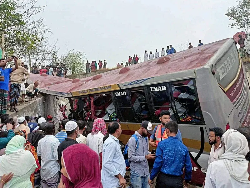 Bus falls into a roadside ditch in Shibchar upazila in Madaripur on 19 March 2023.