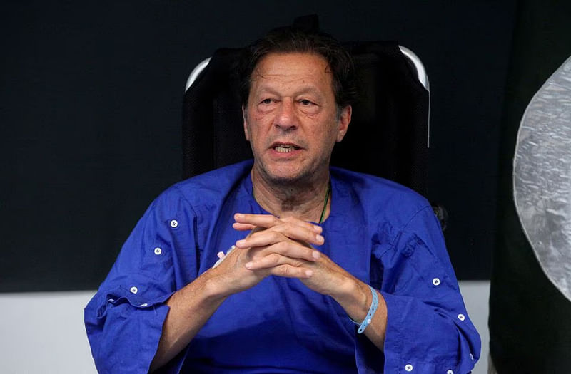 Former Pakistan's Prime Minister Imran Khan addresses a news conference after he was wounded following a shooting incident during a long march in Wazirabad, at the Shaukat Khanum Memorial Cancer Hospital & Research Centre in Lahore, Pakistan on 4 November, 2022.