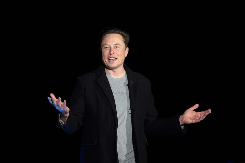 In this file photo taken on 10 February, 2022 Elon Musk speaks during a press conference at SpaceX's Starbase facility near Boca Chica Village in South Texas. Musk has put the current value of Twitter at $20 billion, less than half the $44 billion he paid for the social media platform just five months ago, according to an internal email seen by American news media.