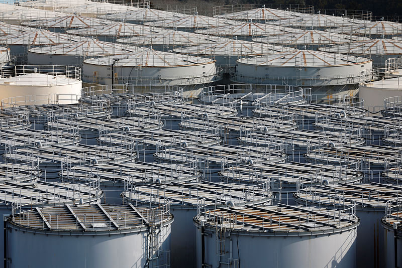 Tanks containing water from the disabled Fukushima Dai-ichi nuclear power plant are seen at the power plant in Okuma town, Fukushima prefecture, Japan, March 8, 2023