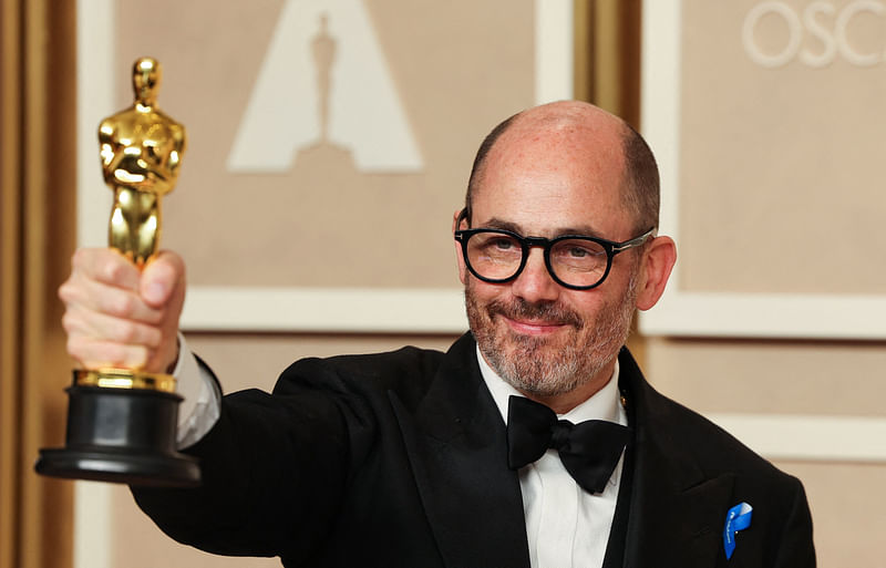 Edward Berger poses with his Oscar for Best International Feature Film for 'All Quiet on the Western Front' in the Oscars photo room at the 95th Academy Awards in Hollywood, Los Angeles, California, US, 12 March, 2023.