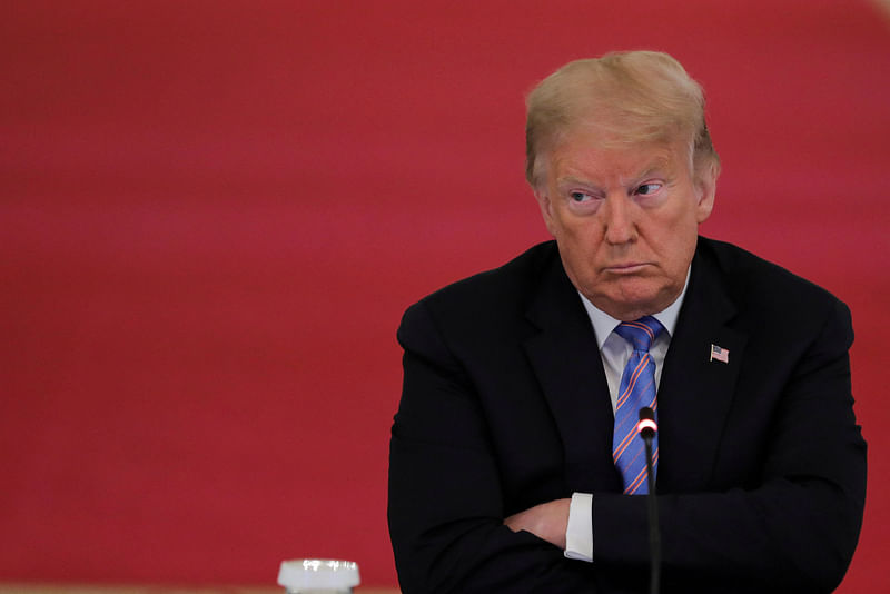 U.S. President Donald Trump listens during a meeting of the American Workforce Policy Advisory Board in the East Room at the White House in Washington, US, June 26, 2020