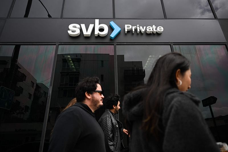 In this file photo taken on 20 March, 2023 the SVB Private logo is displayed outside of a Silicon Valley Bank branch in Santa Monica, California. First Citizens Bank will buy "all the deposits and loans" of Silicon Valley Bank, after it went bankrupt at the beginning of March, a US banking agency said 26 March, 2023.