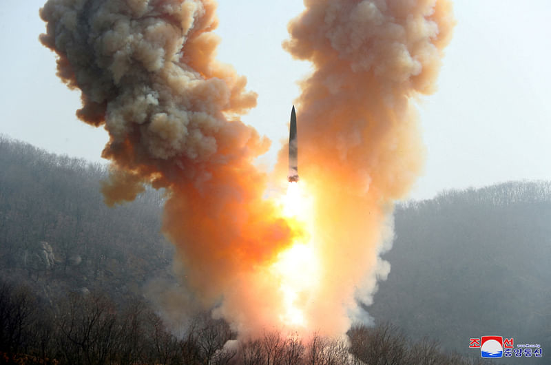 A view shows a missile fired by the North Korean military at an undisclosed location in this image released by North Korea's Central News Agency (KCNA) on March 20, 2023