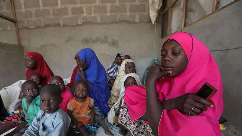 People who fled attacks by bandits in a village are pictured in a shelter for displaced people in Gusau, Zamfara, Nigeria, on 8 February, 2023.