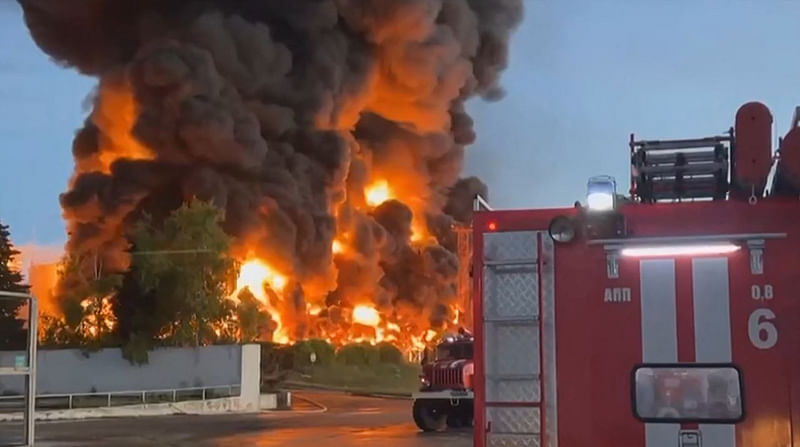 This video grab taken from a footage released on April 29, 2023, on the Telegram chanel of Mikhail Razvozhayev, the Moscow-installed governor of Sevastopol, shows a huge fire at a fuel depot in Sevastopol