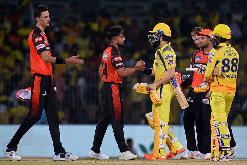 Chennai Super Kings' Moeen Ali and Devon Conway greet Sunrisers Hyderabad's players at the end of the Indian Premier League match between Chennai Super Kings and Sunrisers Hyderabad at the MA Chidambaram Stadium in Chennai on 21 April 2023