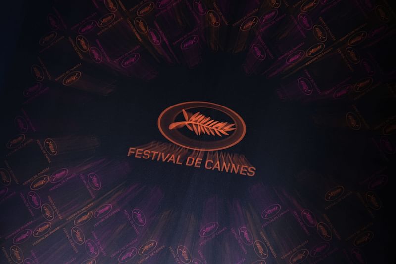 This photograph taken on 13 April, 2023 shows the Cannes Film festival logo during the press conference to announce the Official Selection of the 76th Cannes Film Festival in Paris. The 76th Cannes Film Festival will be held from 16 to 27 May, 2023.