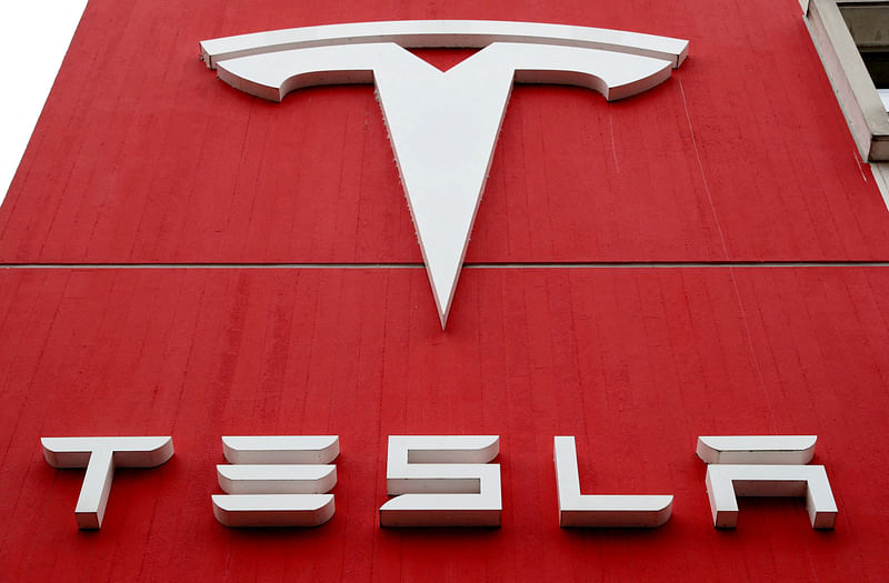 The logo of car manufacturer Tesla is seen at a branch office in Bern, Switzerland 28 October, 2020.