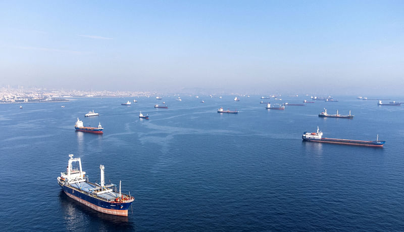 Commercial vessels including vessels which are part of Black Sea grain deal wait to pass the Bosphorus strait off the shores of Yenikapi during a misty morning in Istanbul, Turkey, October 31, 2022