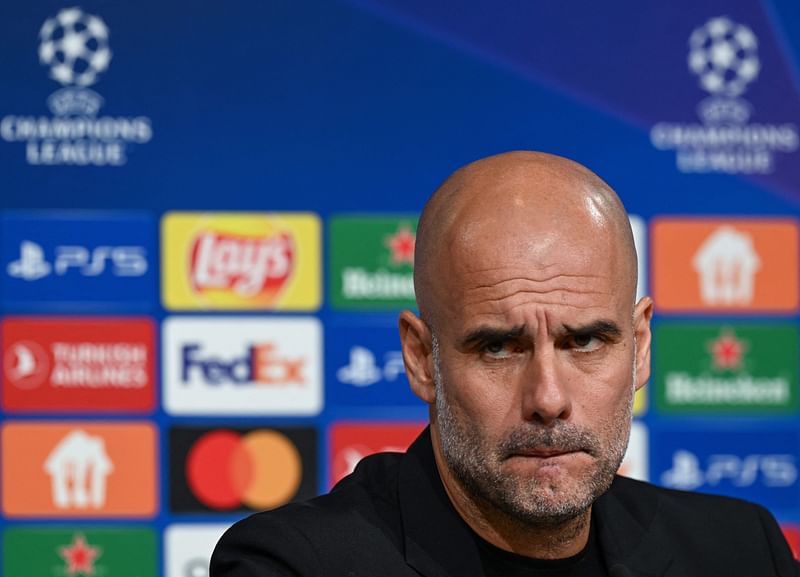 Manchester City's Spanish manager Pep Guardiola addresses a press conference on the eve of the UEFA Champions League quarter-final, second leg match between Bayern Munich and Manchester City in Munich, southern Germany on 18 April 2023