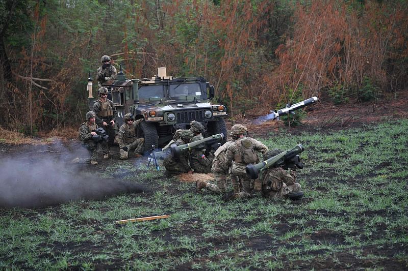 A Philippine soldier (C) fires a Javelin anti-tank weapon system during the live exercise as part of the US-Philippines joint military exercise “Balikatan” at Fort Magsaysay in Nueva Ecija province, north of Manila on 13 April, 2023