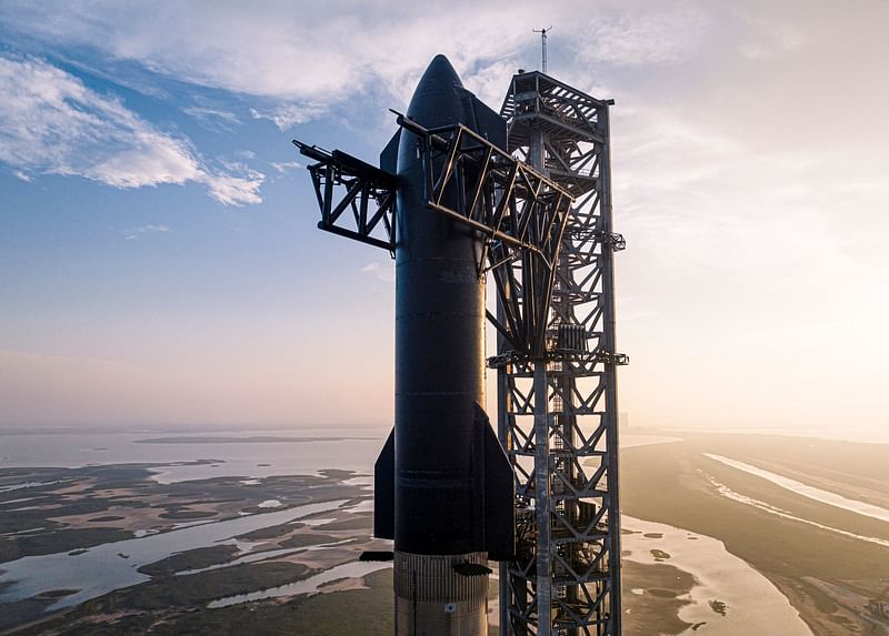 This handout image provided by SpaceX shows the 164-foot (50-meter) tall Starship spacecraft sits atop the 230-foot tall Super Heavy rocket from Starbase in Boca Chica, Texas on 15 April, 2023. On 17 April, 2023 SpaceX plans to carry out its first test flight of Starship, the most powerful rocket ever built, designed to send astronauts to the Moon and eventually beyond.