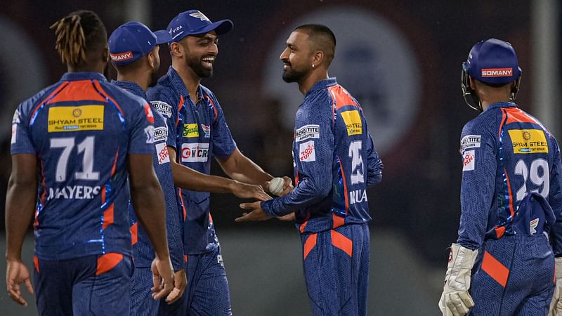 Lucknow Super Giants' players celebrates after the dismissal of Sunrisers Hyderabad's Aiden Markram during the Indian Premier League match between Lucknow Super Giants and Sunrisers Hyderabad at the Ekana Cricket Stadium in Lucknow on 7 April 2023