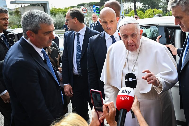 Pope Francis addresses the media as he leaves the Gemelli hospital on April 1, 2023 in Rome, after being discharged following treatment for bronchitis