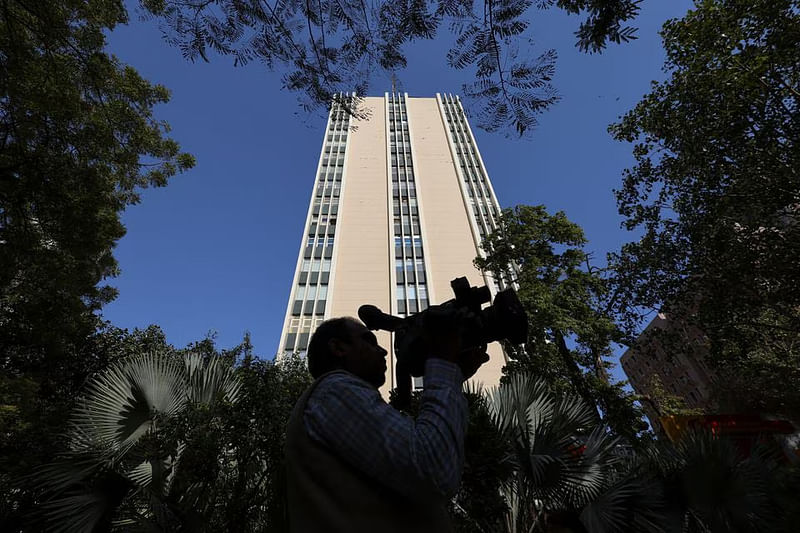 A cameraman works outside a building having BBC offices, where income tax officials are conducting a search, in New Delhi, India, on 14 February, 2023.