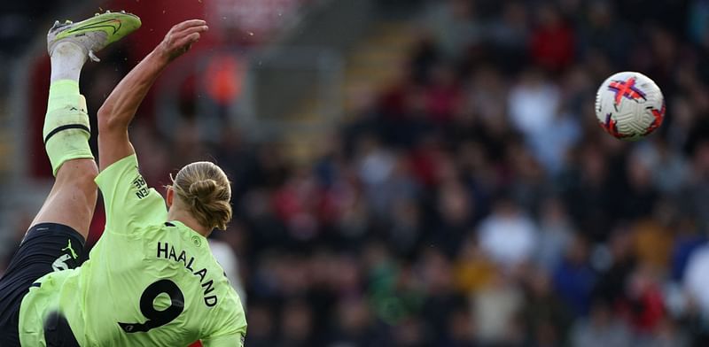 Manchester City's Norwegian striker Erling Haaland scores their third goal with this overhead kick during the English Premier League football match between Southampton and Manchester City at St Mary's Stadium in Southampton, southern England on 8 April, 2023