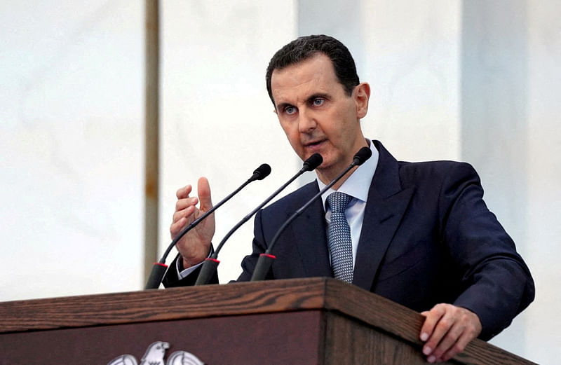 Syria's President Bashar al-Assad addresses the new members of parliament in Damascus, Syria in this handout released by SANA on 12 August, 2020