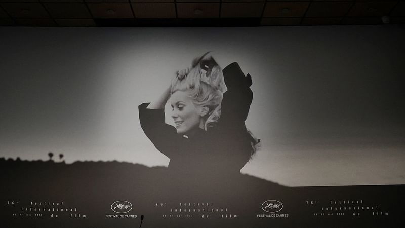 The 76th Cannes Film Festival - The official poster - Cannes, France, 15 May, 2023. The official poster of the 76th Cannes film festival, featuring Catherine Deneuve on the shooting of the film La Chamade, is seen in the conference room on the eve of the opening ceremony.