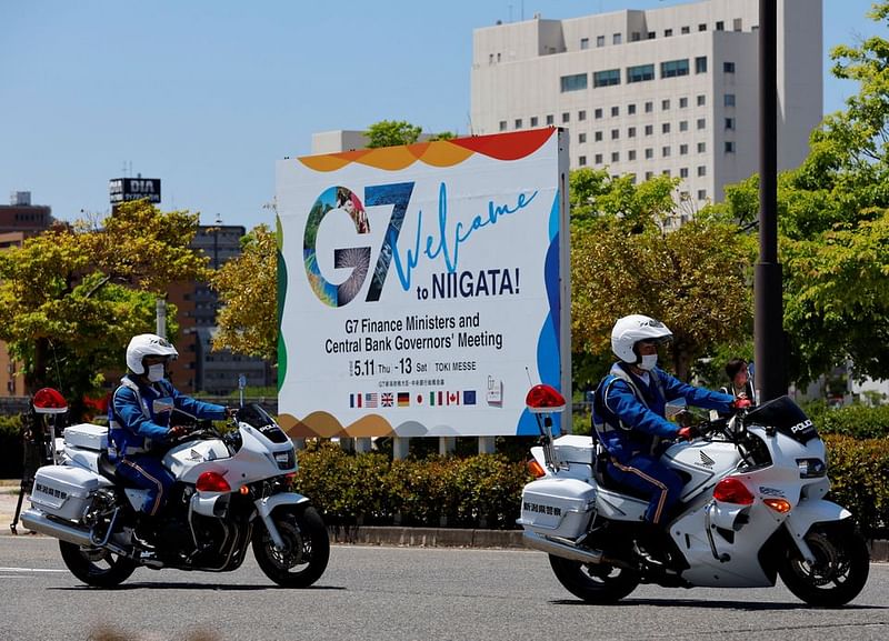 Police officers riding motorbikes patrol near the venue of the G7 Finance Ministers and Central Bank Governors' meeting, in Niigata, Japan, on 11 May, 2023.