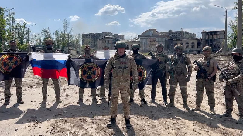 Founder of Wagner private mercenary group Yevgeny Prigozhin makes a statement as he stand next to Wagner fighters in the course of Russia-Ukraine conflict in Bakhmut, Ukraine, in this still image taken from video released 20 May, 2023